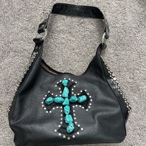 Turquoise cowhide cross detail bag